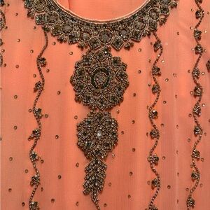 Embellished Peach Dress with Intricate Beading
Shalwar kameez/ desi clothes